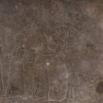 ライオン狩り　馬ていたちが王の乗る馬を引いている、狩りの準備が整いつつある