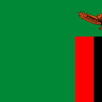 ザンビア国旗　緑は天然資源、赤は独立戦争、黒は国民、オレンジは鉱物資源、鳥はワシで自由と前進を表わす