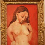 ピカソ　赤い背景の裸婦